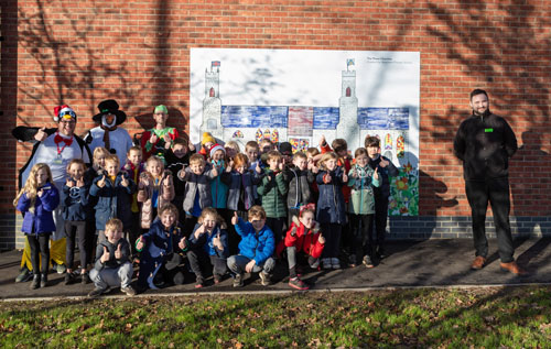 Children and staff from Reepham Primary School with Central England Co-op Reepham team leader Blain Price (right). Photos: Central England Co-op