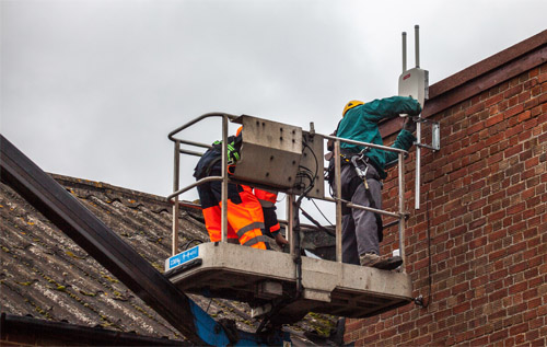 Vodafone femtocell units being installed at Reepham Garage Services, Collers Way Industrial Estate, Reepham. Photos: John Tym