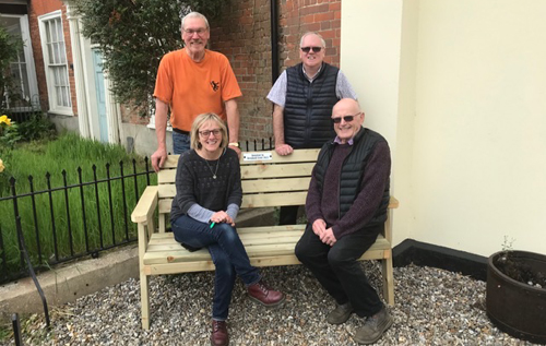 Reepham Lions president Barry Howes (seated, right) with Bircham Centre manager Polly Brockis (seated, left), Bircham Centre caretaker Robert Taylor (standing, left) and chair of the Bircham Centre trustees Les West (standing, right). Photo: Reepham Lions