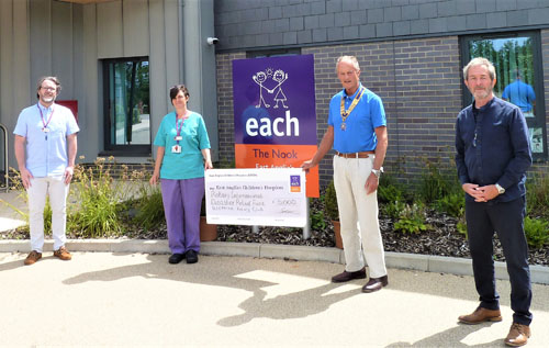 Left to right: Tim Jenkins, EACH community fundraiser; Louise Gower, EACH deputy service manager; Tony Williams, president, Reepham & District Rotary Club; and Roy Sherlock, Reepham Rotary organiser. Photo: Reepham & District Rotary Club