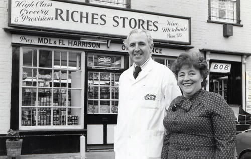 Les and Pat Harrison outside Riches Stores, Market Place, Reepham. Photo: submitted