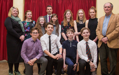 Above: 2018 Youth Speaks finalists, with (adults, left to right) Elle Coney, head of English, RHSC; Alex Edgar, assistant headteacher, RHSC; and John Pickering, Reepham & District Rotary Club. Photo: John Tym