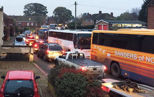 Example of traffic congestion on School Road, Reepham, at 3.45 pm on a school day. Photo: Colin Prince
