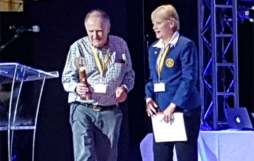 John Pickering receiving the John Grant Trophy from Pauline Dean